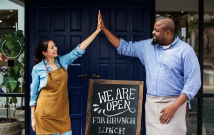 Business Owners Celebrating Their Opening