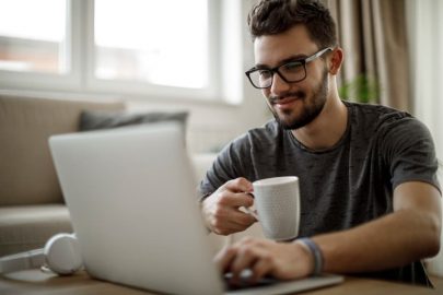 Man Studies At Home