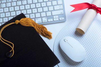 College Degree and Graduate Cap with Computer Mouse and Keyboard