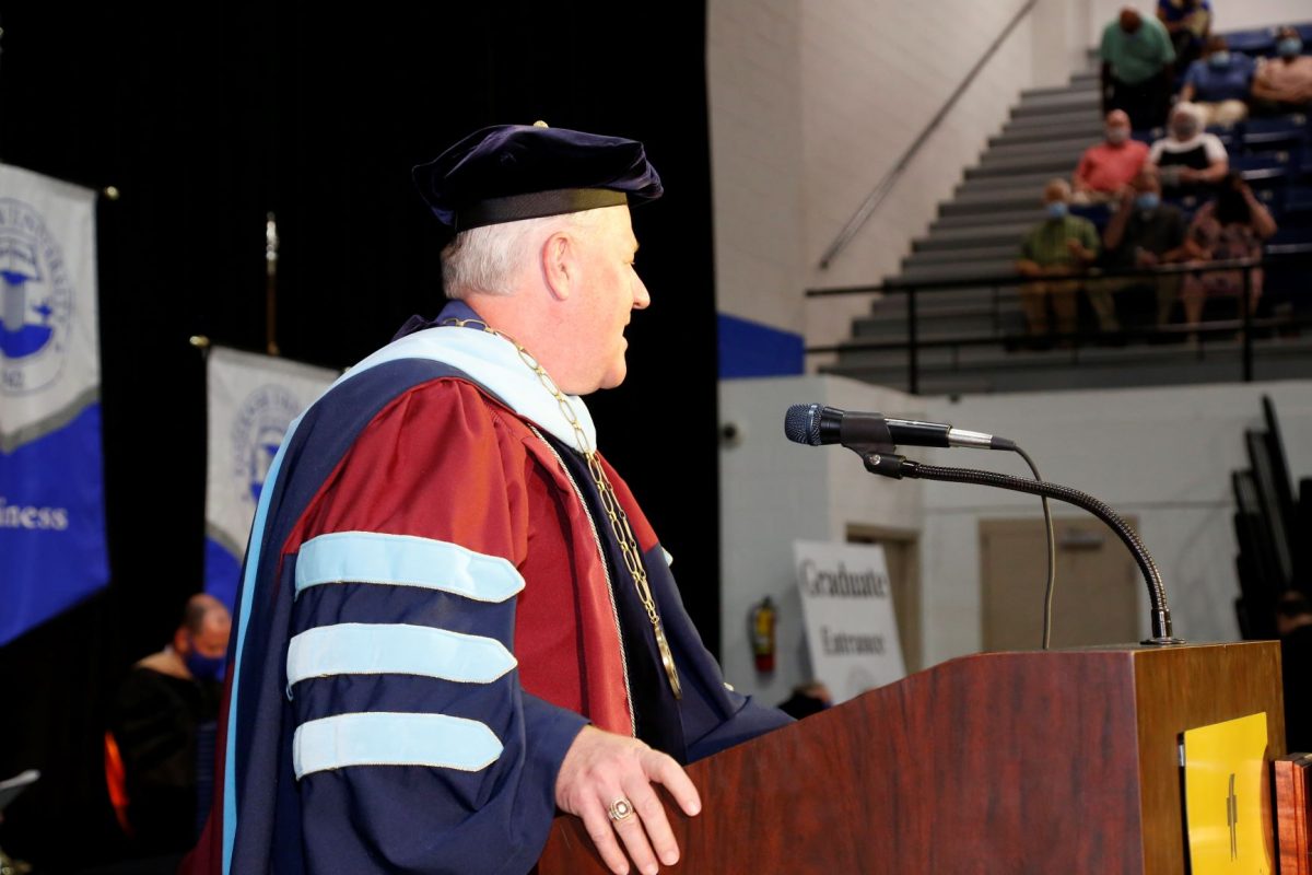 Faulkner President Mike Williams addresses the crowd during the 2020 Spring commencement ceremony on Auugust 8.