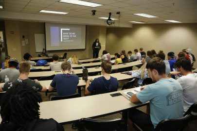 Students attend a lecture by Andrew Gifford on understanding Biblical literature.