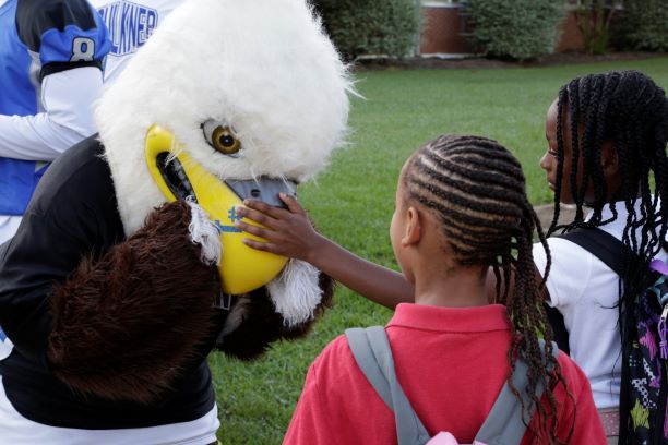 Baldwin greets Davis Elementary students back to school on Monday.