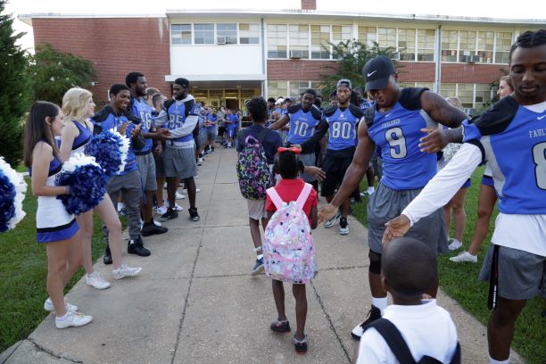 Faulkner athletes welcome Davis Elementary students back to school on Monday.