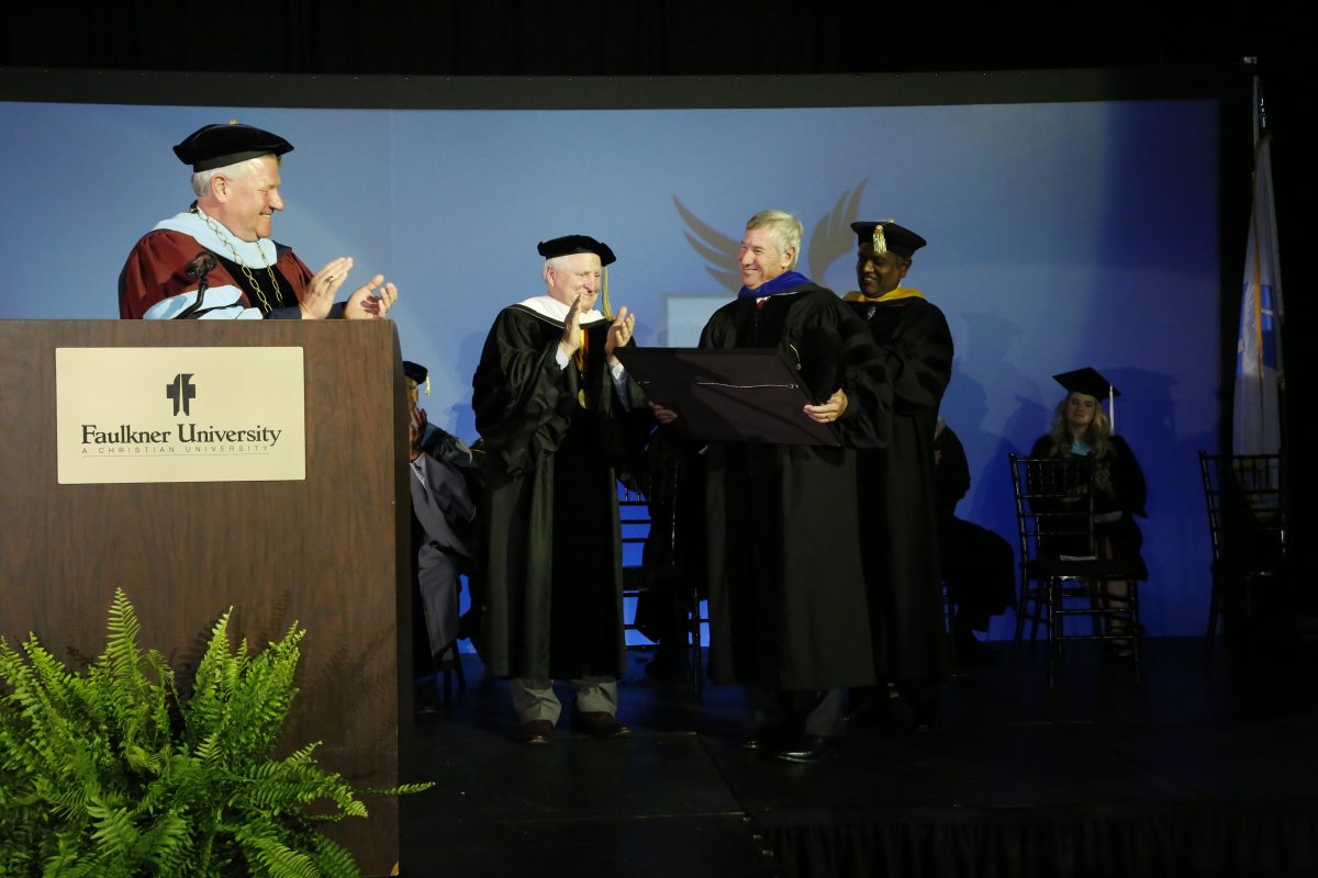 Faulkner University President Mike Williams and Faulkner leadership present Mayor Todd Strange with an honorary Doctor of Humane Letters during the university’s fall 2019 Convocation ceremony on Aug. 19
