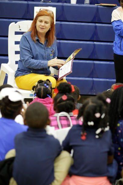 Dr. Cindy Walker reads a spooky story to a class from Davis Elementary School during Faulkner's Fall Festival on Oct. 25.