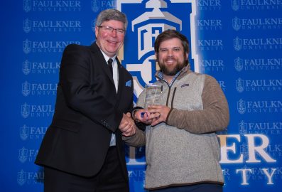 Page Clayton is awarded Distinguished Alumnus during the 2025 Marketplace Faith Friday Forums.