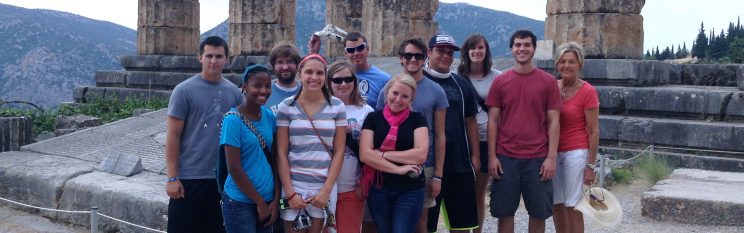 Study Abroad Group Posing in Front of Ancient Ruins
