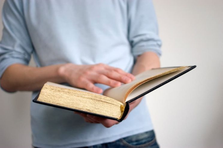 Man holding the bible