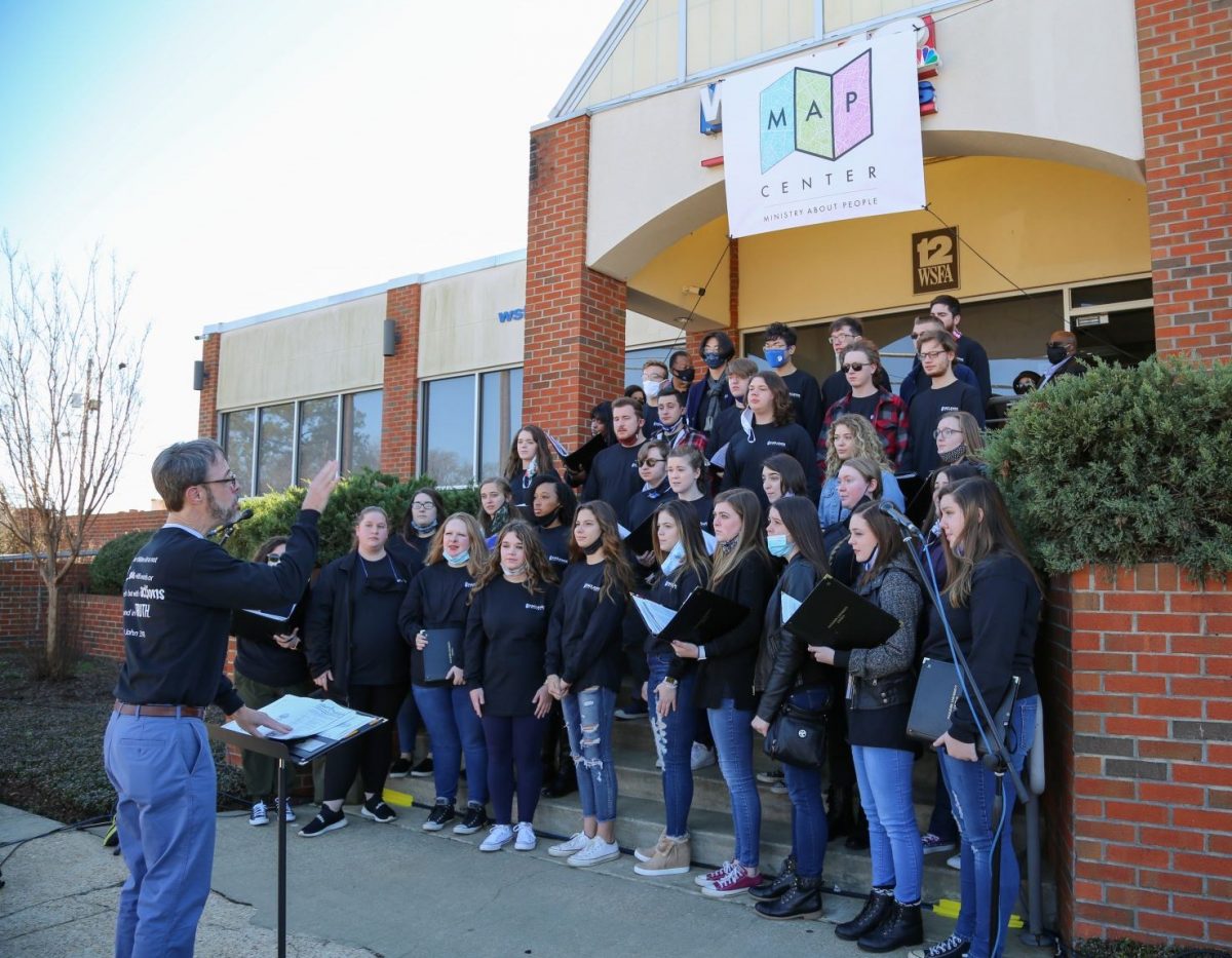 The Faulkner University Chorus sings at a special ribbon-cutting ceremony at Mercy House’s newest location on East Delano Avenue, the former WSFA-TV building on MLK Day, January 18, 2021.
