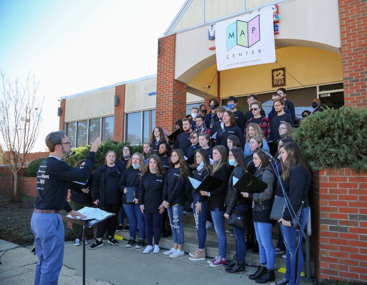 The Faulkner University Chorus sings at a special ribbon-cutting ceremony at Mercy House’s newest location on East Delano Avenue, the former WSFA-TV building on MLK Day, January 18, 2021.