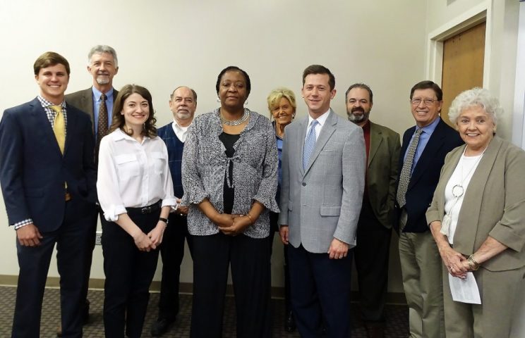 Sonia Price, center stands among faculty and peers from the Social and Behavioral Sciences, l-r Will Dismukes, Amanda Eakin, Nathan Lindsay and Al Millergren.