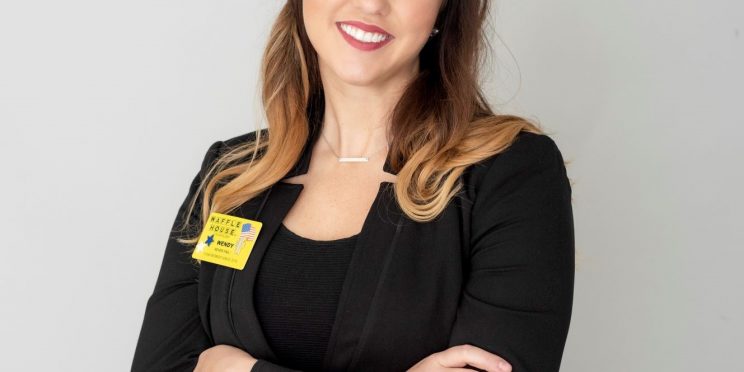Wendy Mose poses in a professional suit.