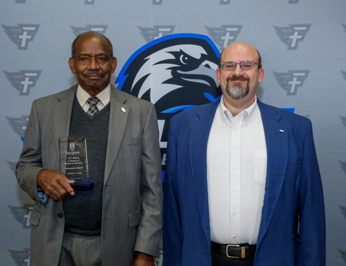 l-r Matthew Conley and Dr. Todd Brenneman pose after Conley was honored during the Marketplace Faith Friday Forums for his service in the classroom and prison ministry. 