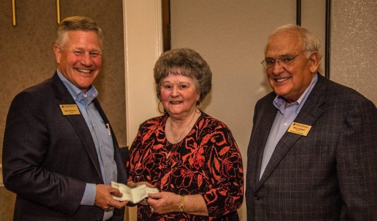 President Mike Williams, Marjorie Snook and Billy Lambert, chair of the Board of Trustees