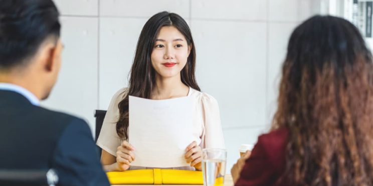 Young business administration graduate preparing for a job interview