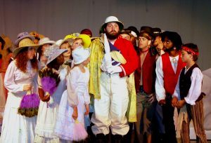 Scene from the Faulkner Dinner Theater play, The Pirates of Penzance featuring Chris Kelly, center.