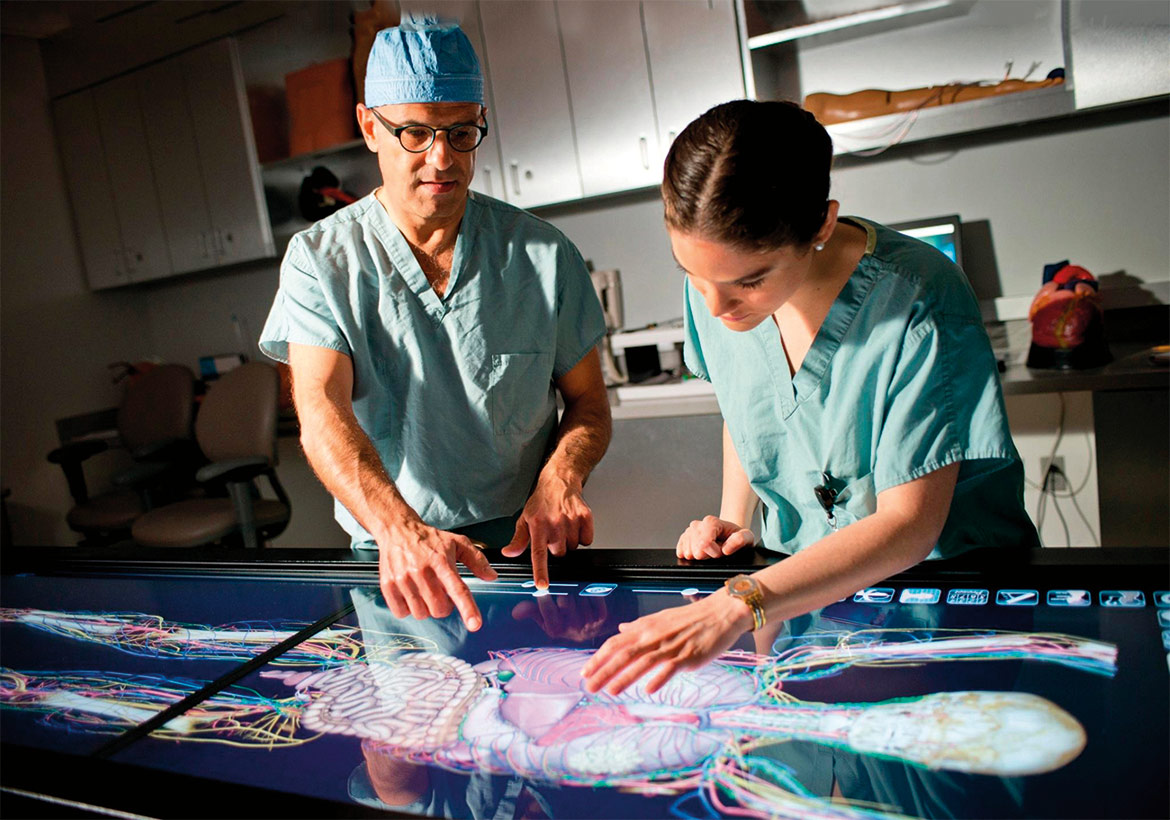 Doctors working at a virtual cadaver table