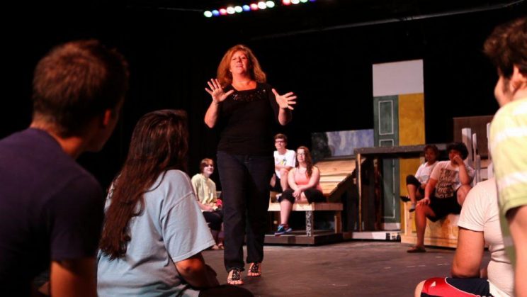 Angie Dickson teaches theatre to students.