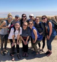 Students pose for a photo at Masada. 