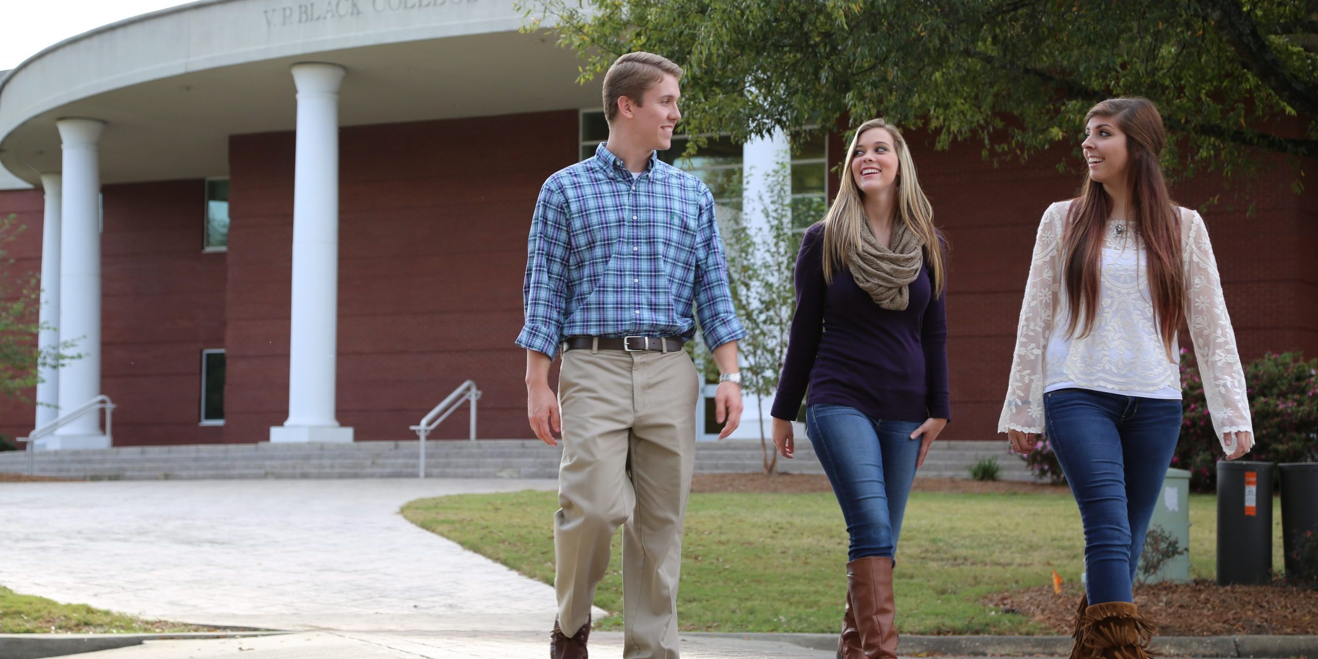 Student walk outside Faulkner's VP Black College of Biblical Studies building. Faulkner just announced it will offer tradition undergraduate Bible majors full tuition.