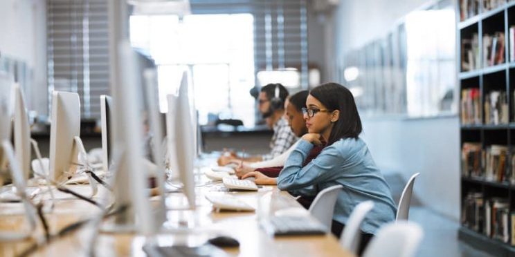 Students at computers in a classroom