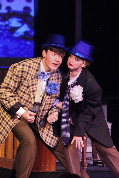 Brittney Johnston and another Faulkner student perform at the Faulkner Dinner Theater.