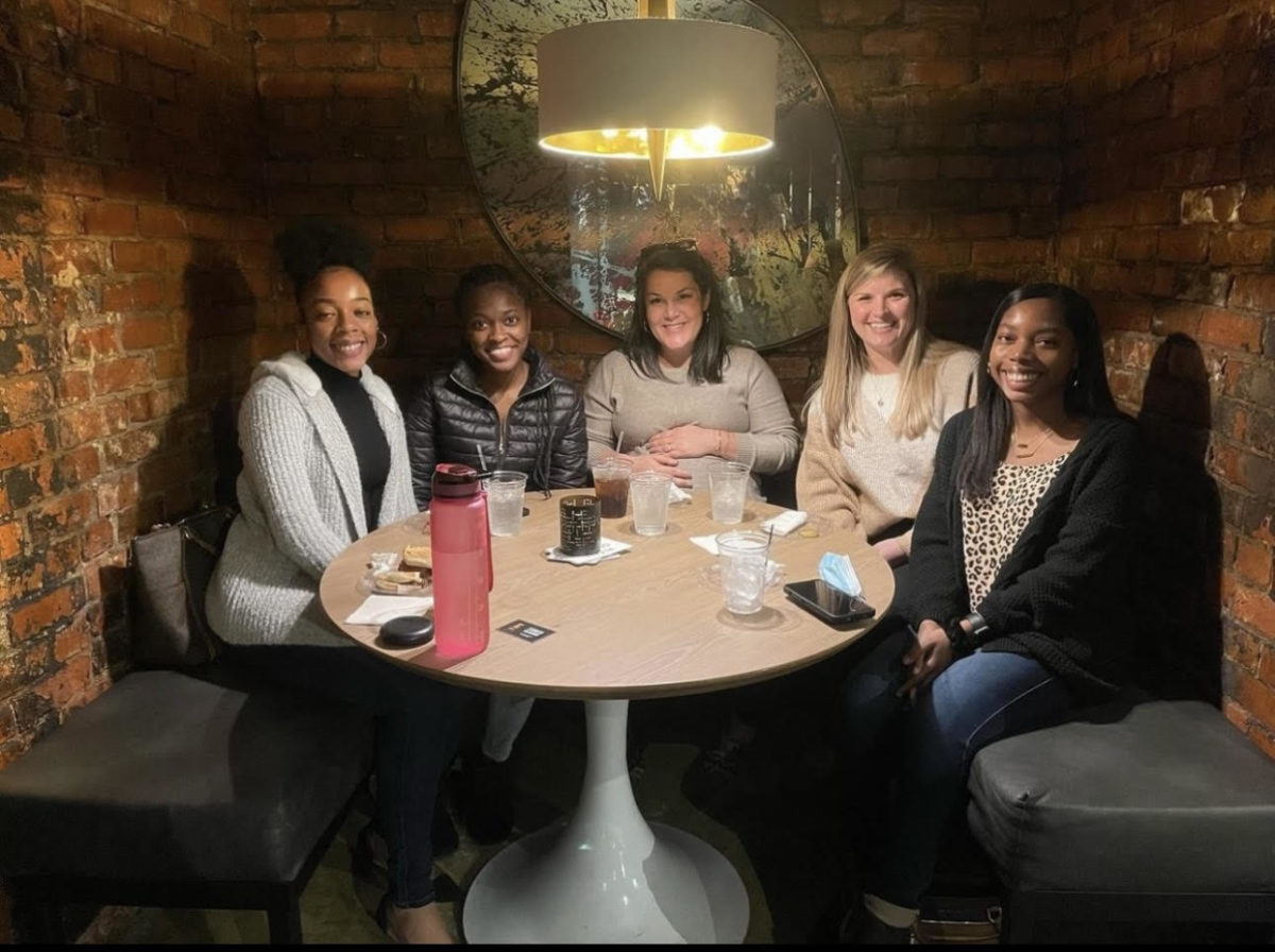 Rahdiashia Davis, right, with her fellow interns and coworkers at Jackson Thornton, the accounting firm she is an intern at.