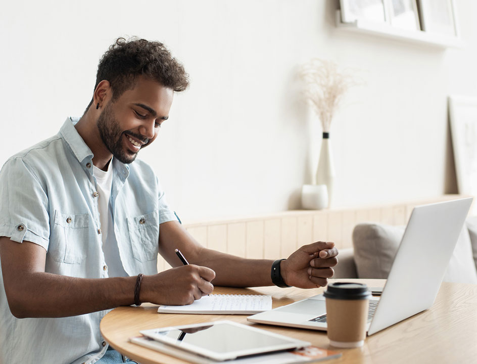 A young man takes an online class