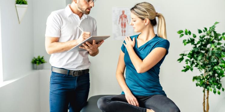 Female client consulting with sports psychologist