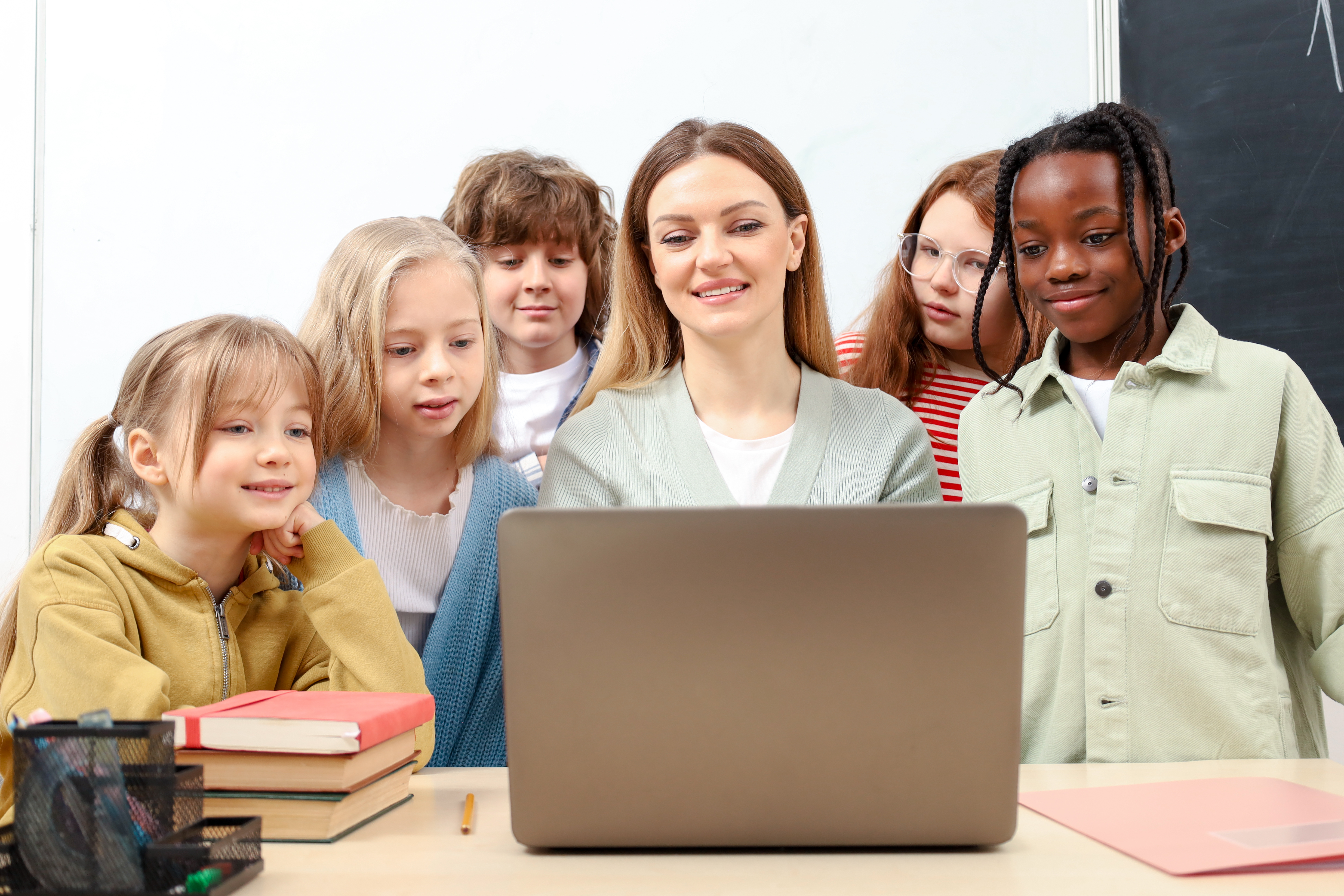 group-of-school-kids-with-teacher-in-classroom-us-2025-02-20-11-12-32-utc (1)