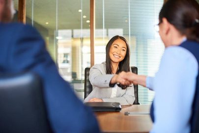 Woman Shaking Hands for Potential Internship