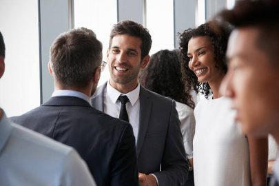 Young Man and Woman in Networking Event