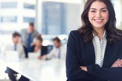 Human Resources Specialist in Front of Colleagues at Conference Table